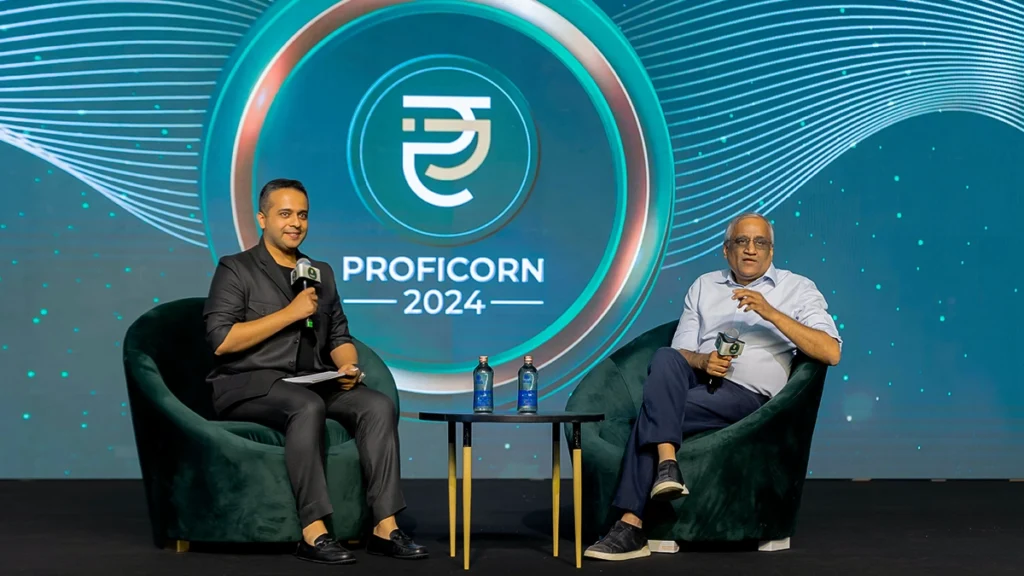 kishore biyani, ceo of the future gropu, and rajiv talreja, MSME business coach having a fireside chat at proficorn 